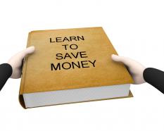 Book of learn to save money stock photo