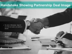 Handshake showing partnership deal image