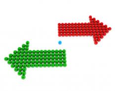 Red and green arrows in different directions stock photo