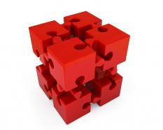 Red puzzle cube for business and leadership stock photo