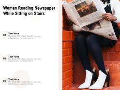 Woman reading newspaper while sitting on stairs