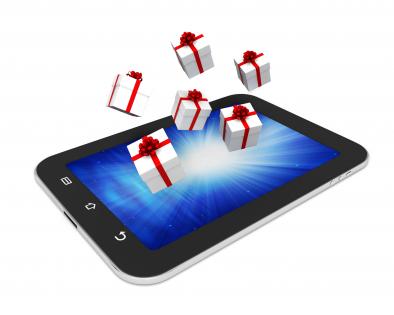 0914 gift boxes coming out of pc tablet stock photo