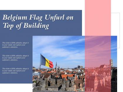 Belgium flag unfurl on top of building