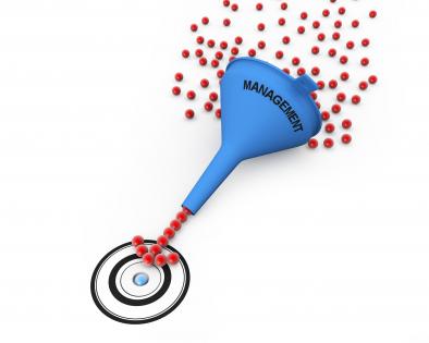 Blue funnel with word management showing target stock photo