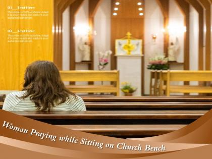 Woman praying while sitting on church bench